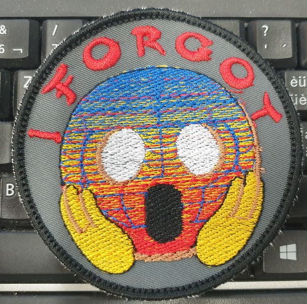 Fichier:Badge-screaming-face-2.jpg