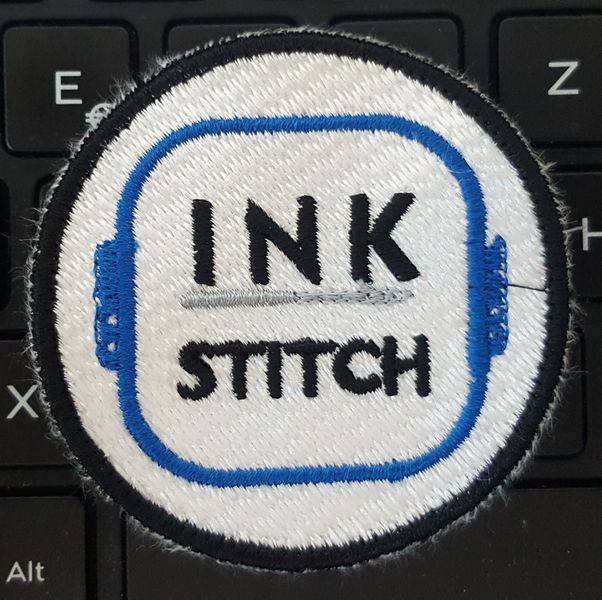 Fichier:Inkstitch-patch-61-5mm-logo-V3-jpg.jpg