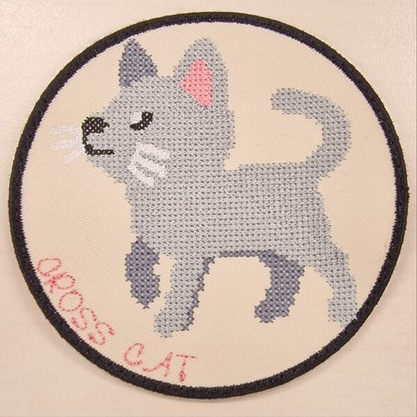 Ecusson avec un emoji de chat