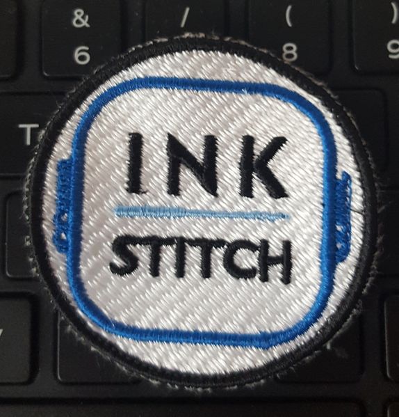 Fichier:Inkstitch-patch-61-5mm-logo-V1 (1).jpg