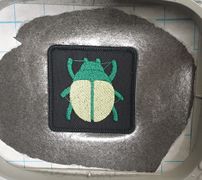 Emoji Beetle sur le patch 6x6 proposé