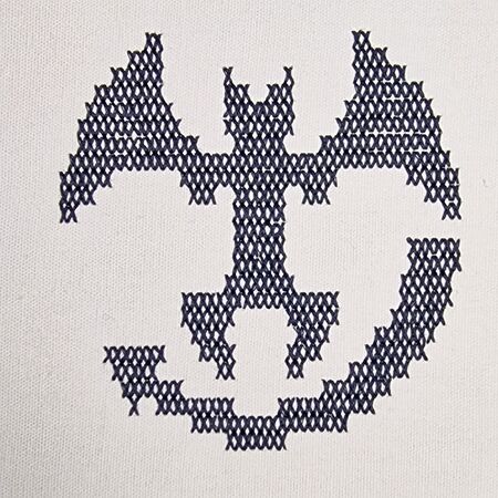Brodé sur coton blanc