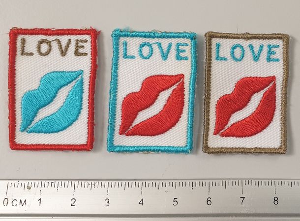 Postage stamps with LOVE (4th version is to the right)